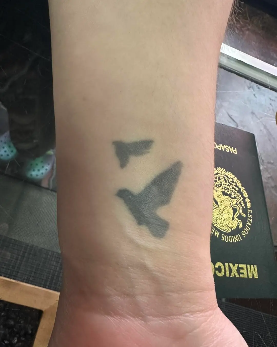 Original tattoo of birds before coverup tattoo