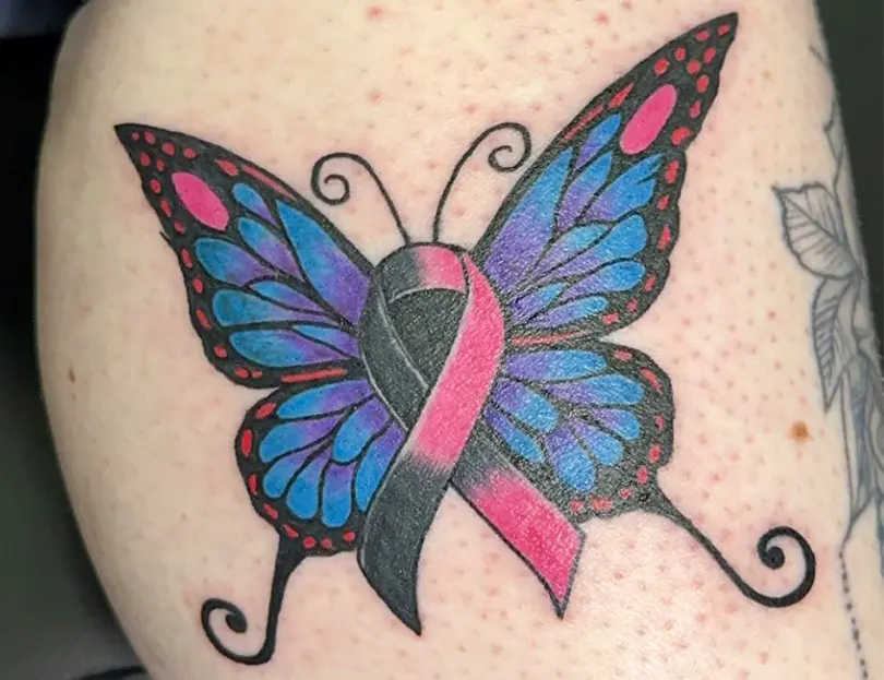 Watercolor shark forearm tattoo